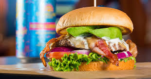 Smitty's Garage Burgers and Beer signature dishes Bacon Avocado Ranch Burger, Sticky Finger Burger (with peanut butter), Bison Burger, Fresh-Cut Fries